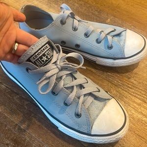 Grey converse shoes with silver sparkle.